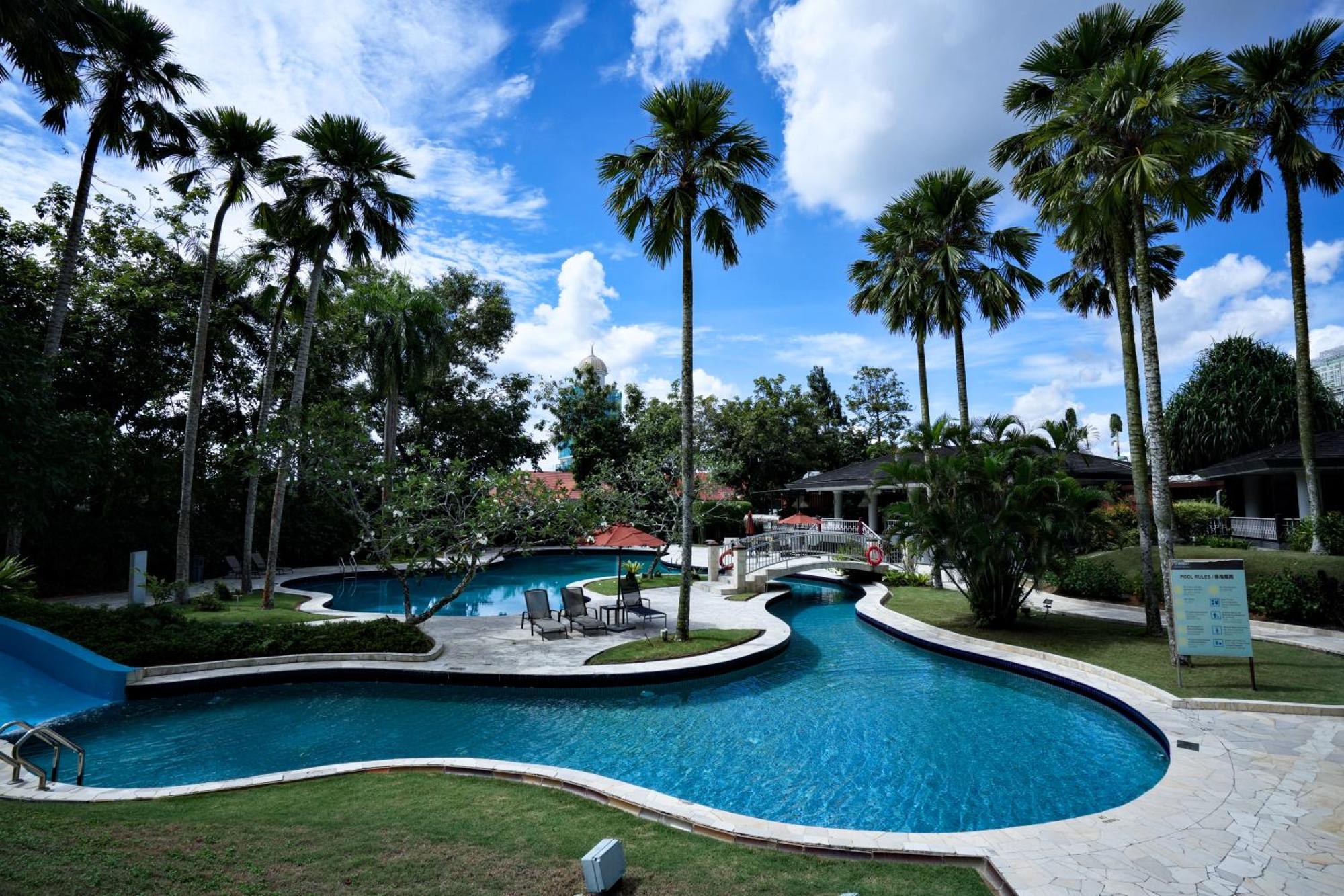 Thistle Johor Bahru Exterior photo The pool at the Royal Thai Police Club